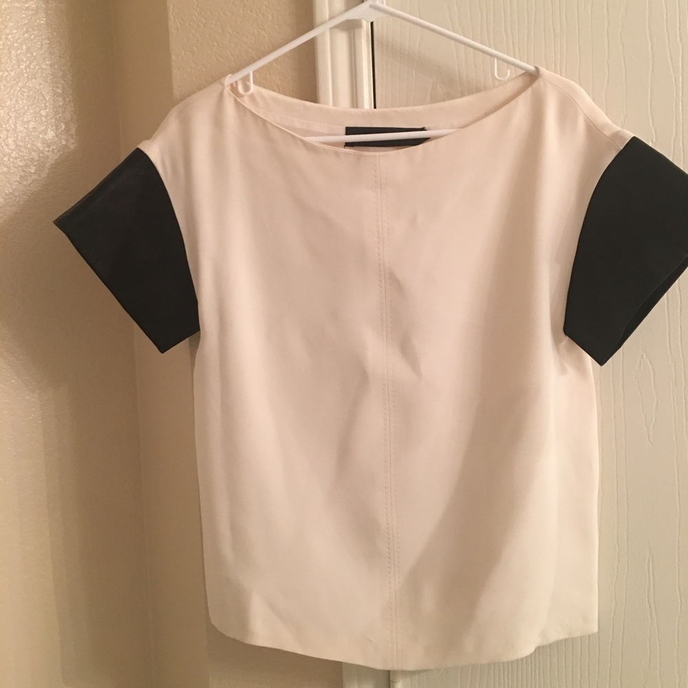 Thakoon silk off-white top with lambskin sleeves.